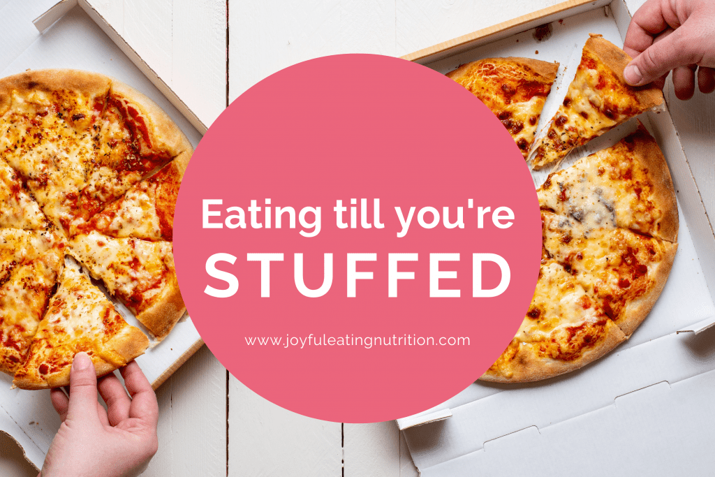 Pizza in boxes with title text, 'eating till you're stuffed'.