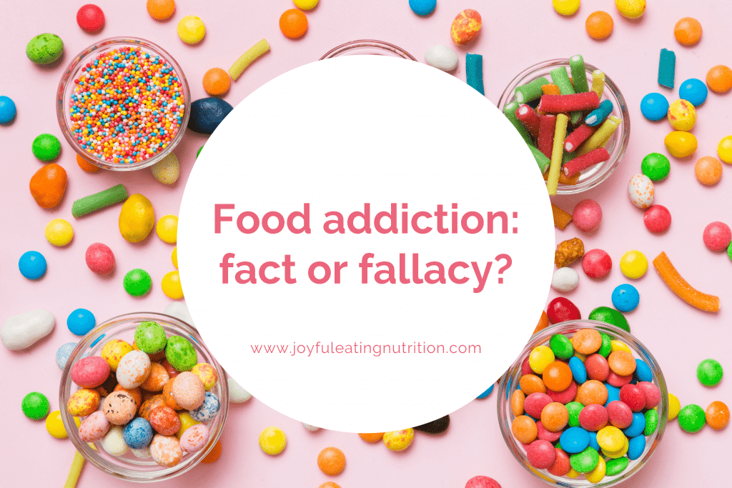 Bowls of lollies on pink background with the words, Food addiction: fact or fallacy?