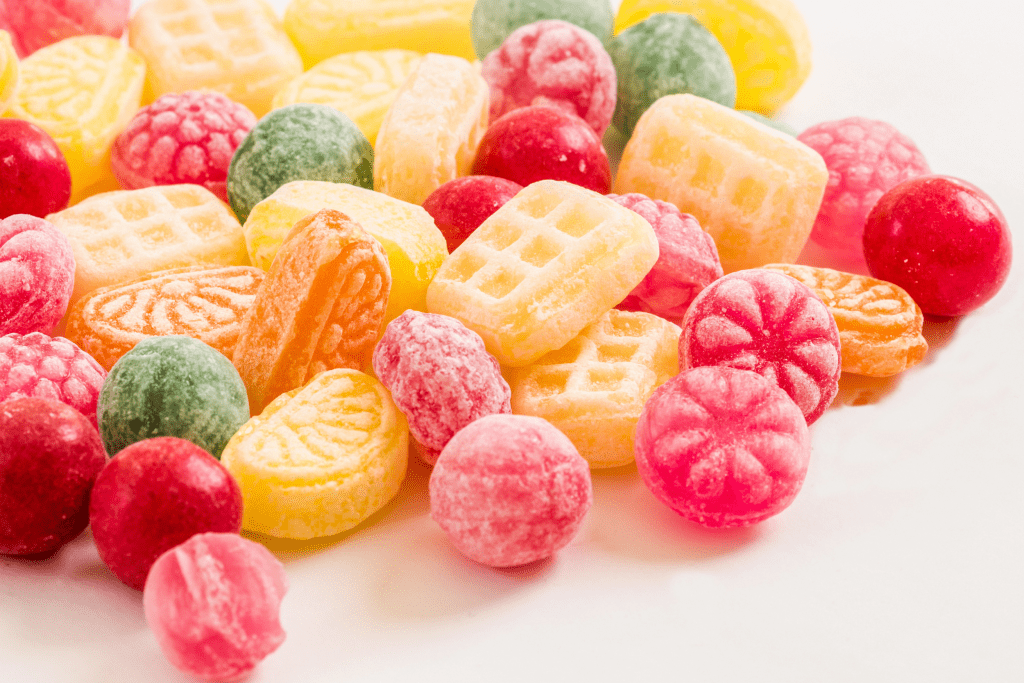 Fruit shaped lollies on a white background