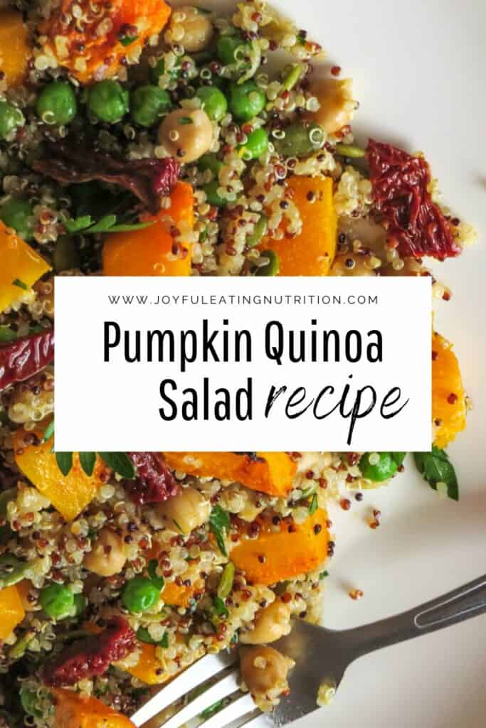 White plate with Pumpkin Quinoa Salad and a fork and recipe title.